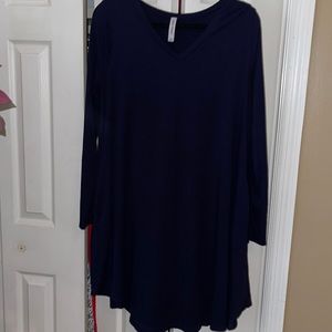 Such a great dress! Hits below knees with pockets. Perfect for fall with boots!